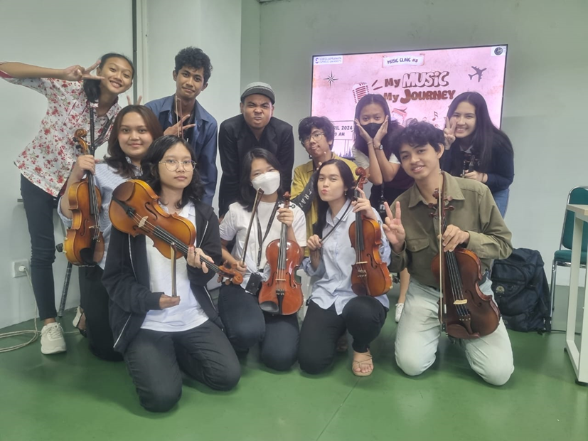 Workshop Music Clinic 2024: Mengasah Bakat dan Kekompakan Orchestra SCU